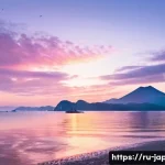 일본 소도시 여행 니가타 - A breathtaking sunrise over Niigata’s coastline where majestic mountain ranges gently meet the expan...