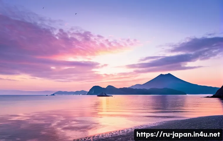 일본 소도시 여행 니가타 - A breathtaking sunrise over Niigata’s coastline where majestic mountain ranges gently meet the expan...